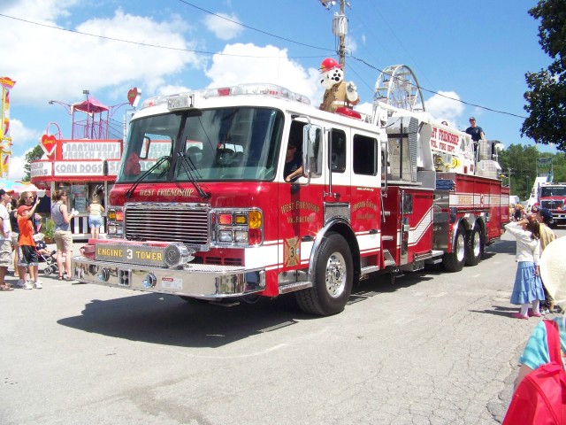 West Friendship VFD Tower 3. Riding on top are Sparky the fire dog with Maryland State Firemen's Association Fire Prevention Queen Colleen Frances of Hampstead VFC
