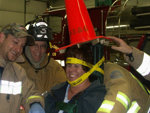 EMS Ked Board Training 01-28-2008 - Debbie H. Saunders as the patient. Dunce cap being applied.