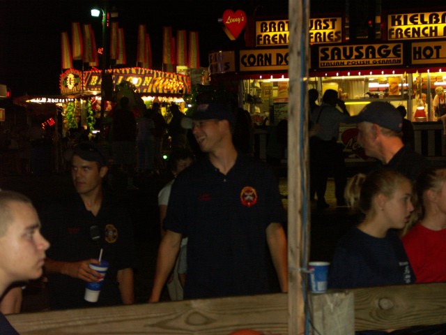 Elkridge Volunteer Fire Department members try their luck at the dunking booth while their Chief Don Watson is in the hot seat.