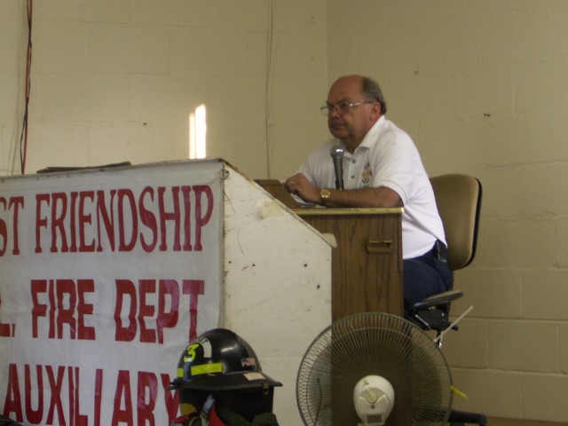 President John Coll calling Bingo numbers.