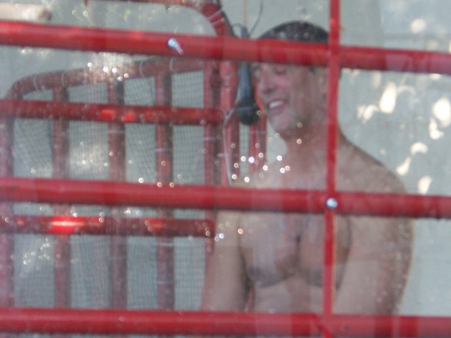 Guy Guzzone of the Maryland House of Representatives waiting to be dunked at the dunking booth.