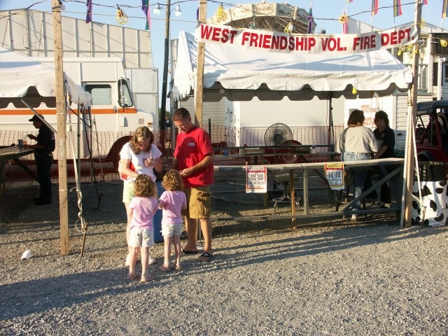 Fair goers try their luck at the Nevada Stand.